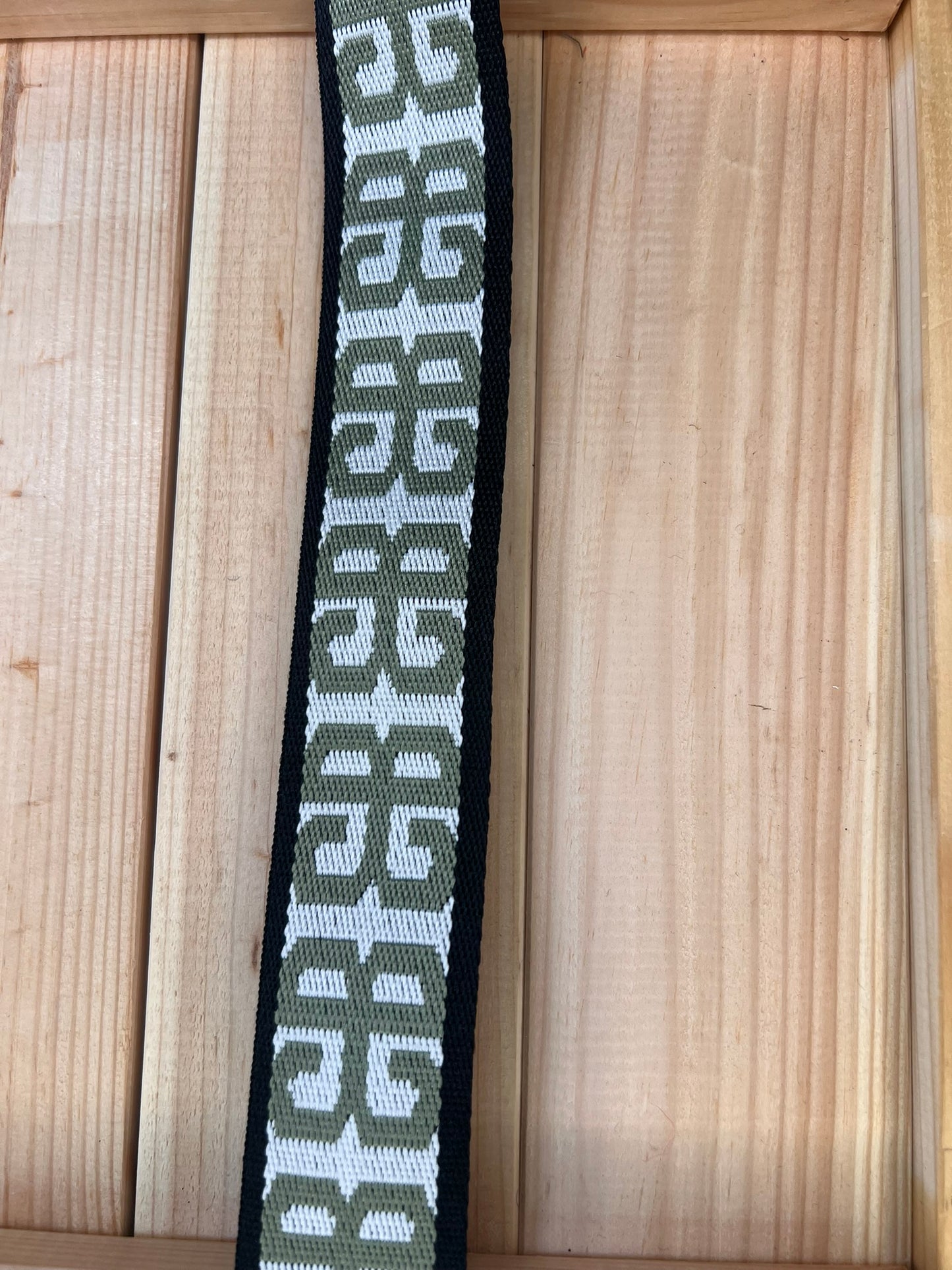 Gurtband Schwarz/Weiß mit Grünen Zeichen 38mm